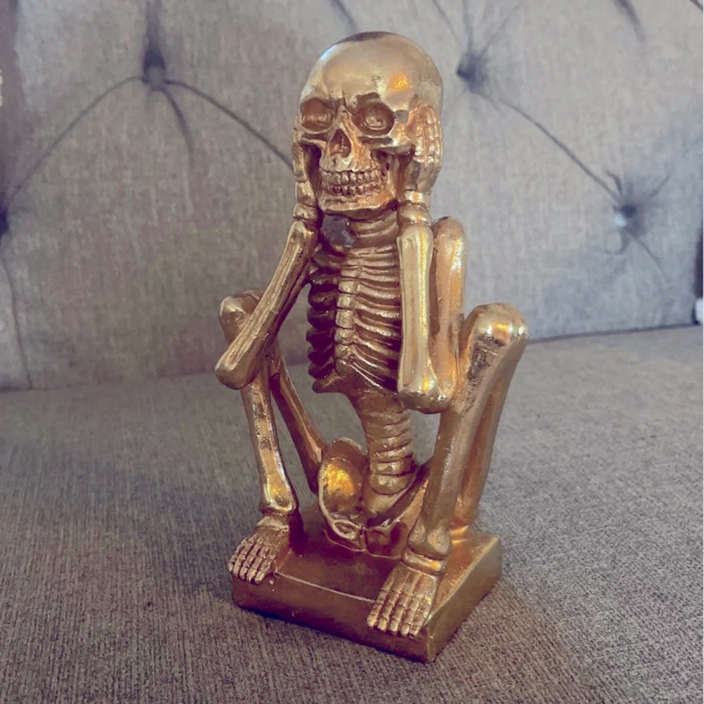 COPY - Hear no evil skeleton statue